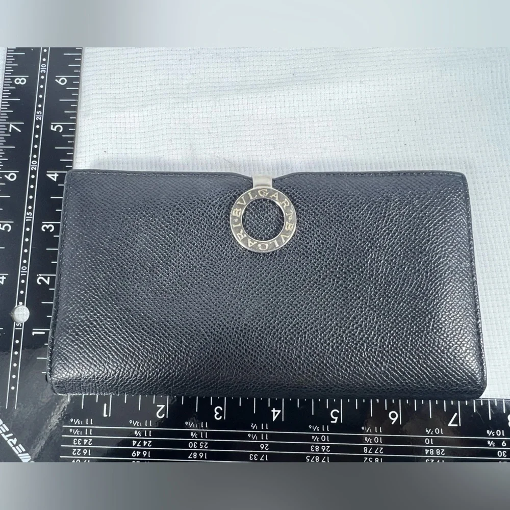 1050: Bvlgari Logo Ring Continental Wallet Black Grained Leather Blue